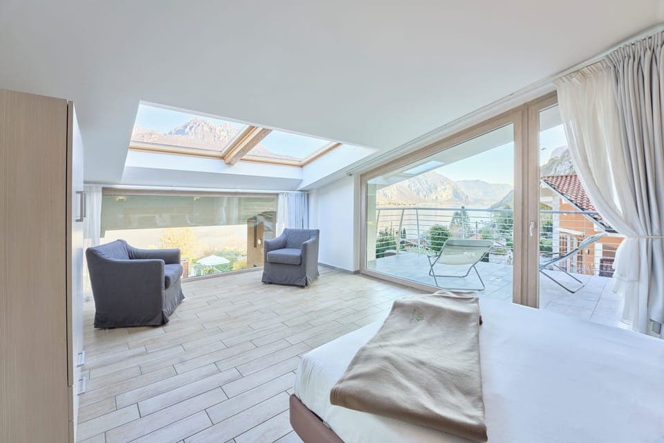 Deluxe Apartment, Lake View | In-room safe, blackout drapes, soundproofing, iron/ironing board