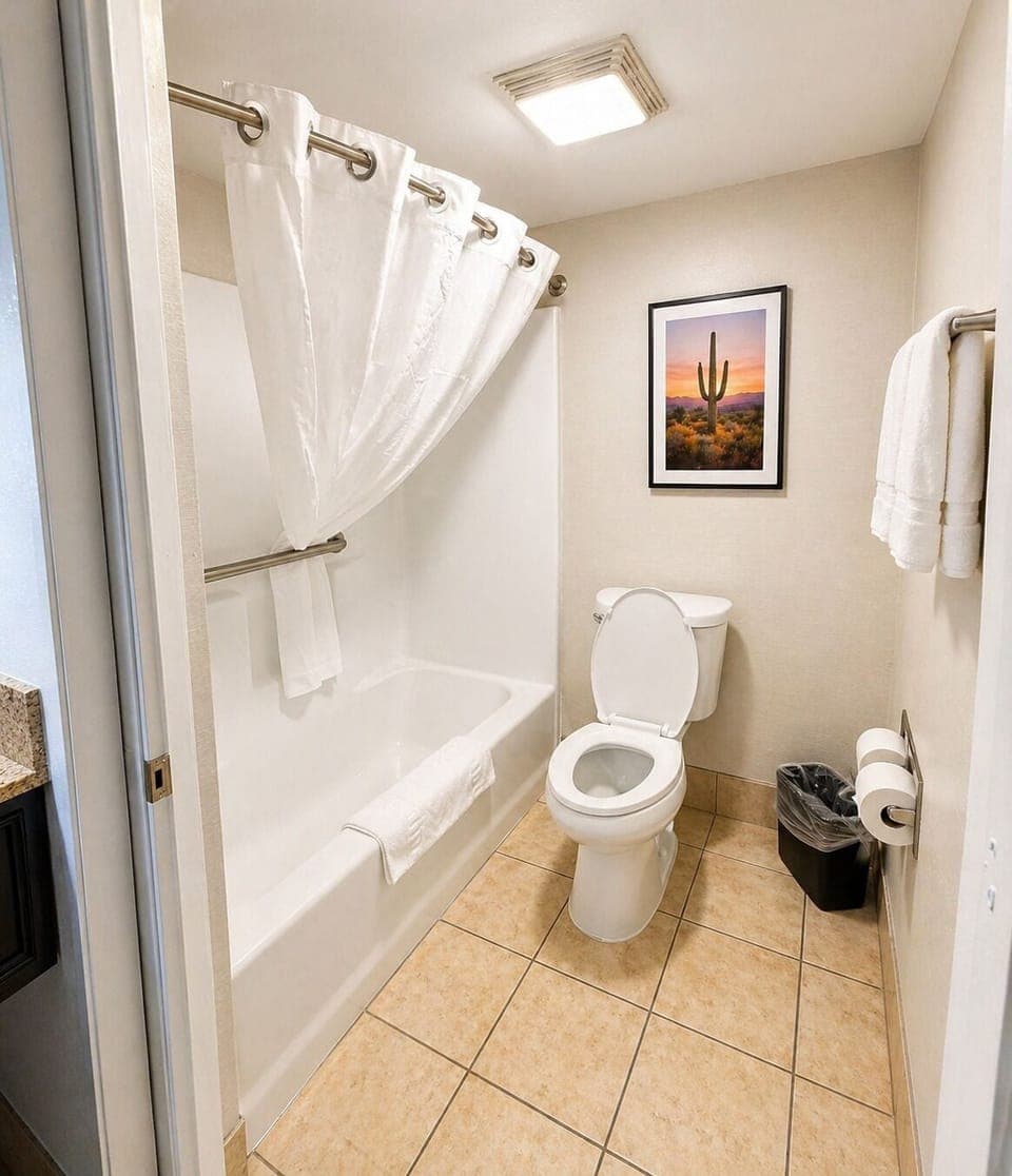 Standard Room, 2 Queen Beds, Pool View | Bathroom | Hair dryer, towels, soap, shampoo