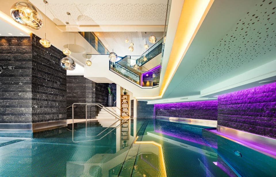 Indoor pool, outdoor pool, pool umbrellas, sun loungers