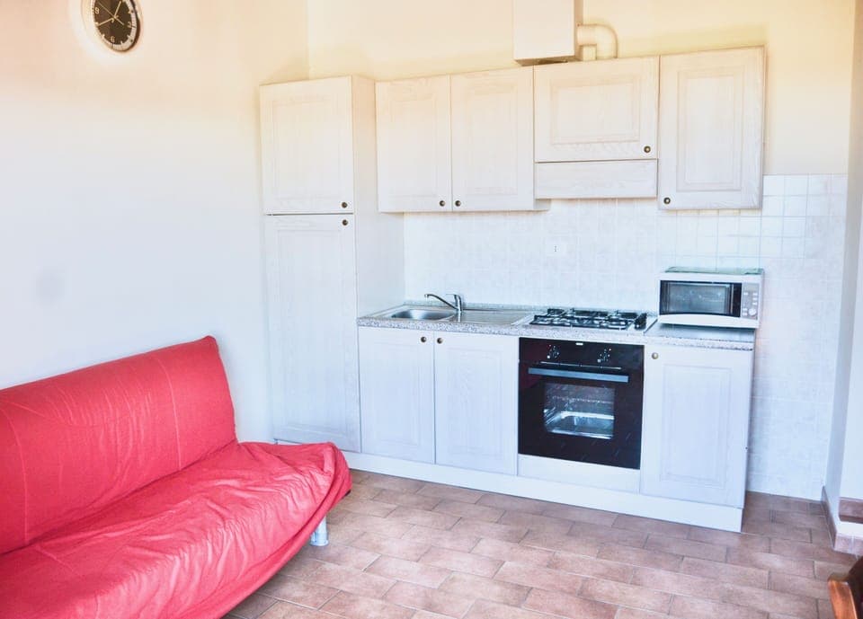 Standard Apartment, Balcony | Private kitchen | Full-size fridge, oven, cookware/dishes/utensils, dining tables