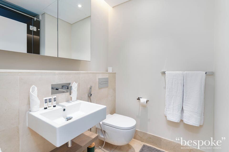 Deluxe Apartment, 2 Bedrooms, Partial Sea View | Bathroom | Free toiletries, hair dryer, towels, soap