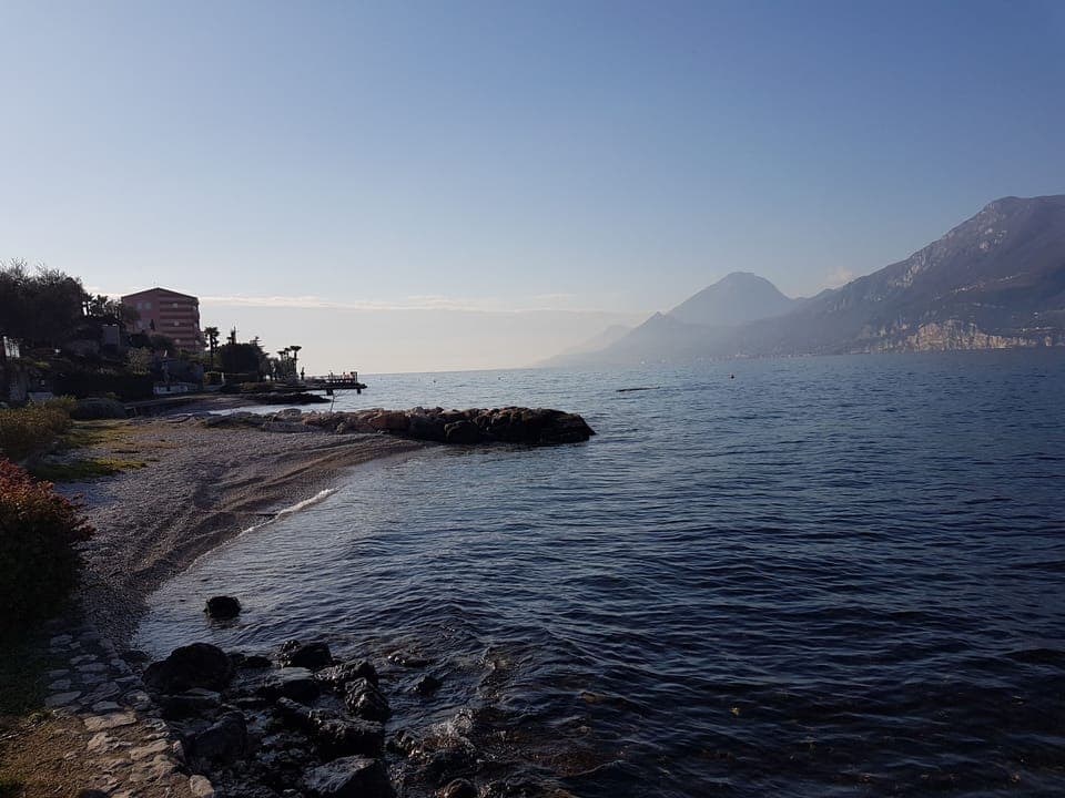 Beach nearby, white sand, sun loungers