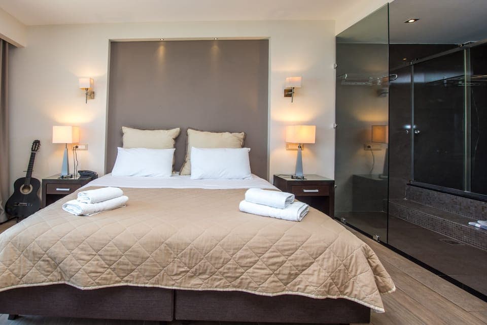 Honeymoon Suite, Sea View | Living area | 32-inch LED TV with satellite channels, TV