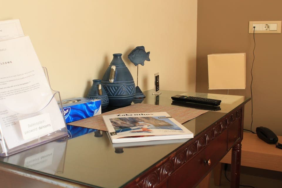 Superior Triple Room, Partial Sea View | Living area | 32-inch LED TV with satellite channels, TV