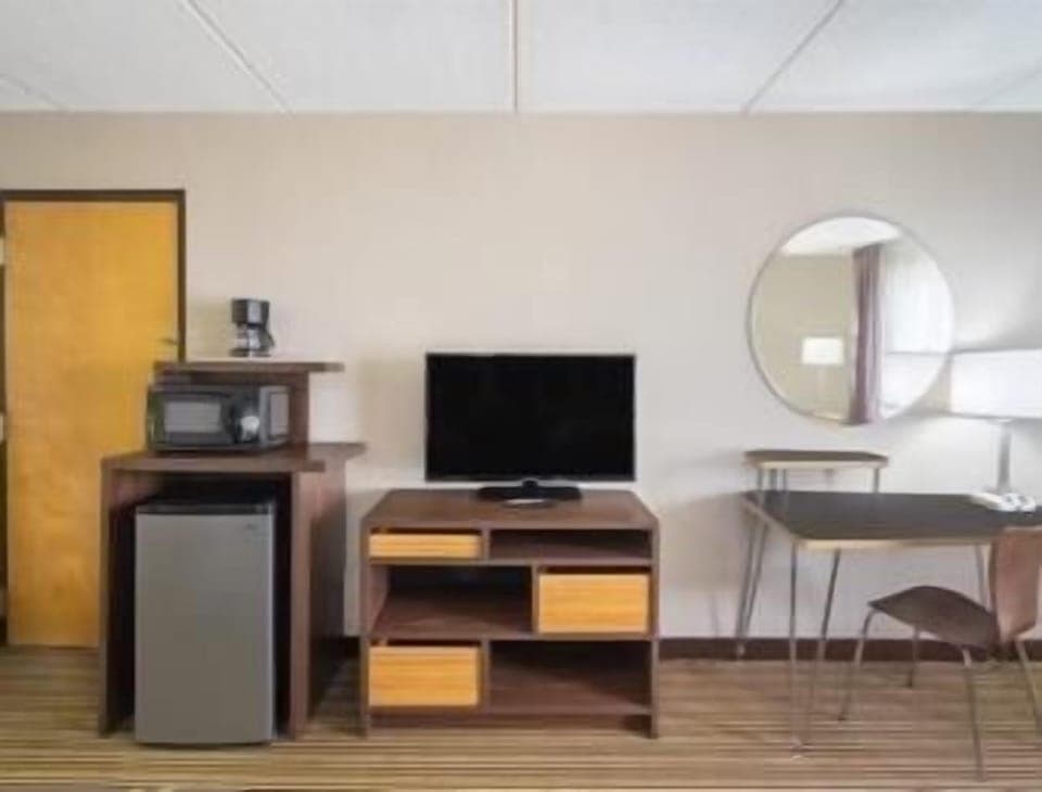 Blackout drapes, iron/ironing board, free cribs/infant beds