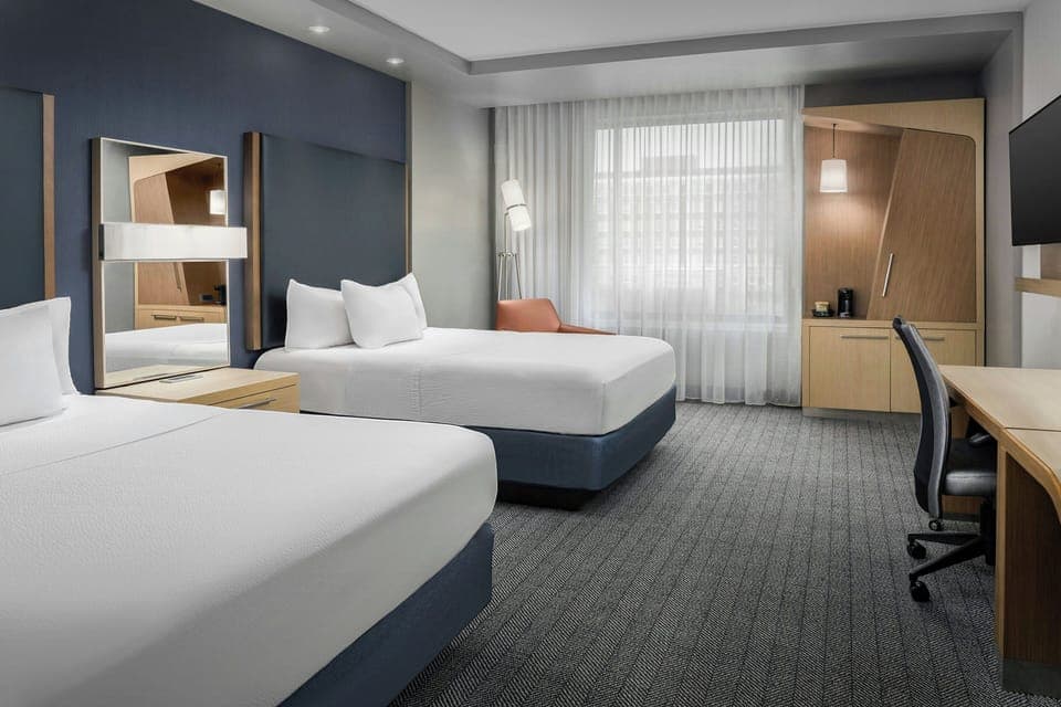 Room, 2 Queen Beds | In-room safe, desk, iron/ironing board, free cribs/infant beds