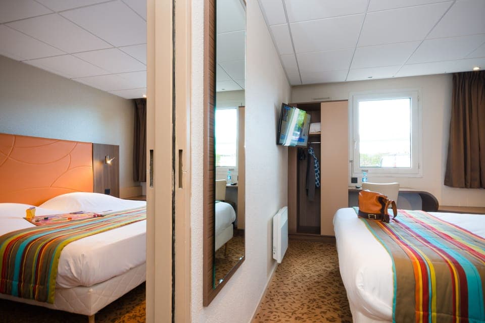 Desk, blackout drapes, soundproofing, iron/ironing board