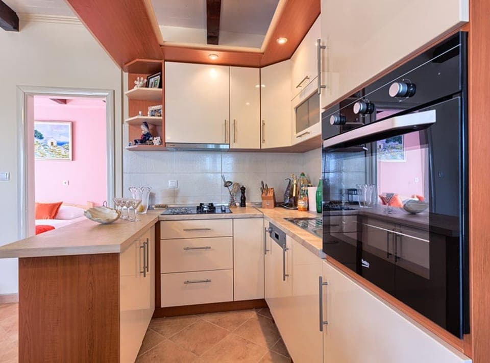 Villa (FourBedroom Beachfront Villa with Poo) | Private kitchen | Fridge