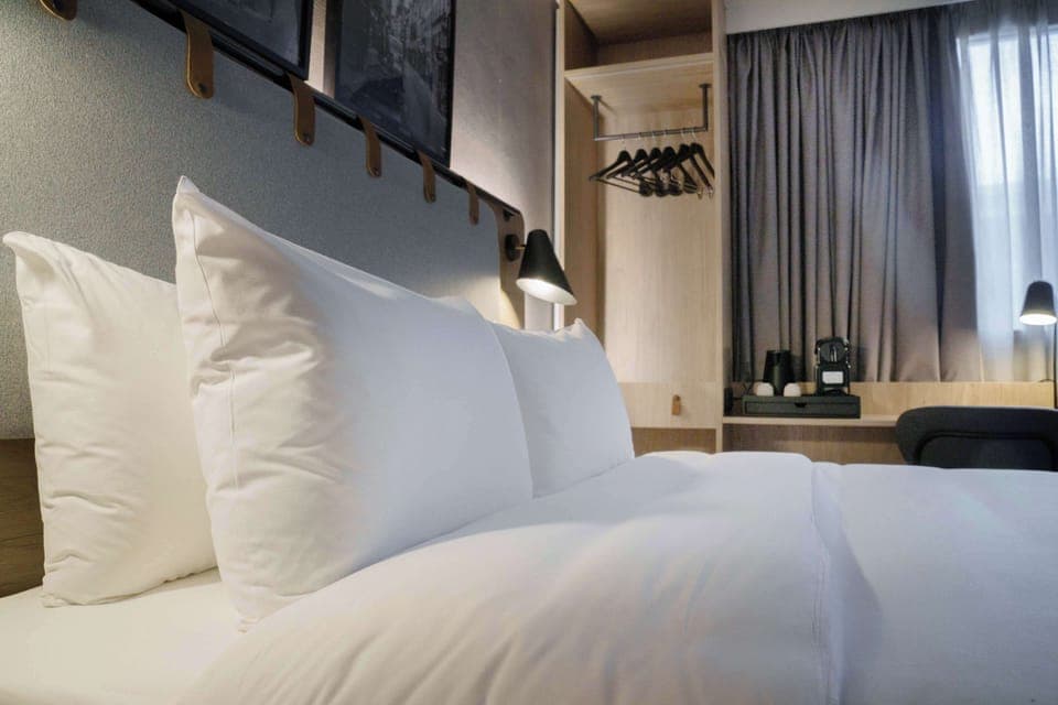 Premium bedding, desk, blackout drapes, iron/ironing board