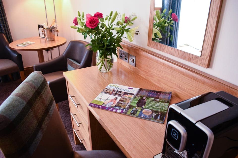 Individually decorated, individually furnished, desk, laptop workspace