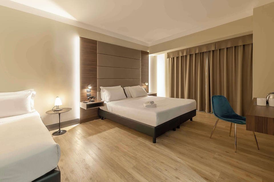 Superior Triple Room | Down comforters, minibar, in-room safe, desk