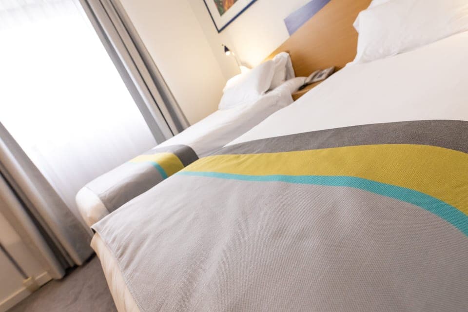 Desk, iron/ironing board, free cribs/infant beds, free rollaway beds