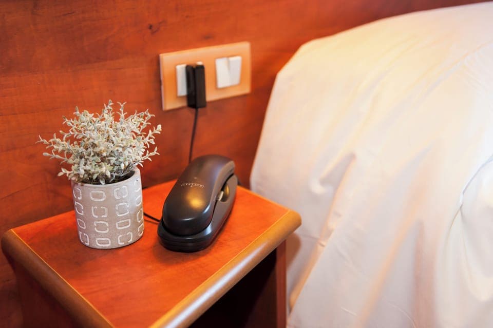 Premium bedding, desk, blackout drapes, soundproofing