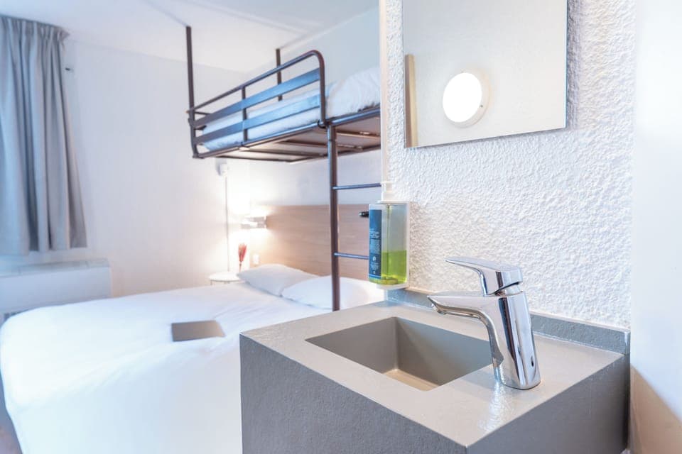 Family Triple Room, Multiple Beds | Desk, blackout drapes, iron/ironing board, free cribs/infant beds