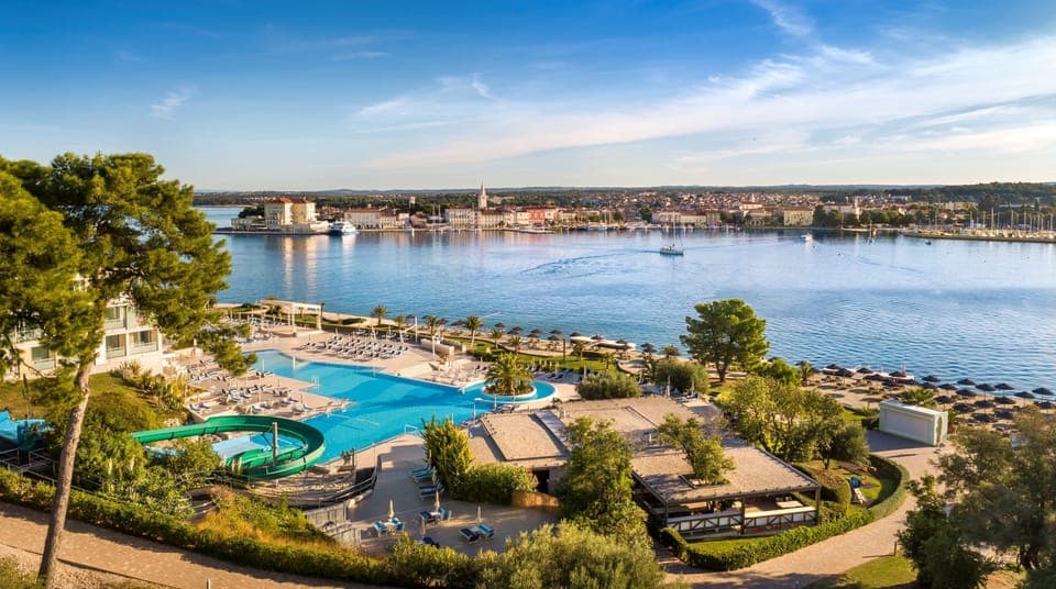 Indoor pool, seasonal outdoor pool, pool umbrellas, sun loungers