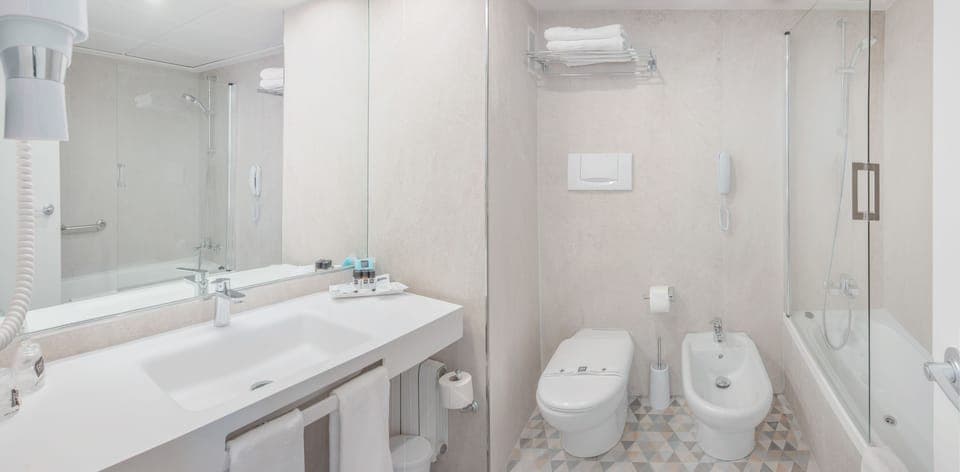 Free toiletries, hair dryer, bidet, towels