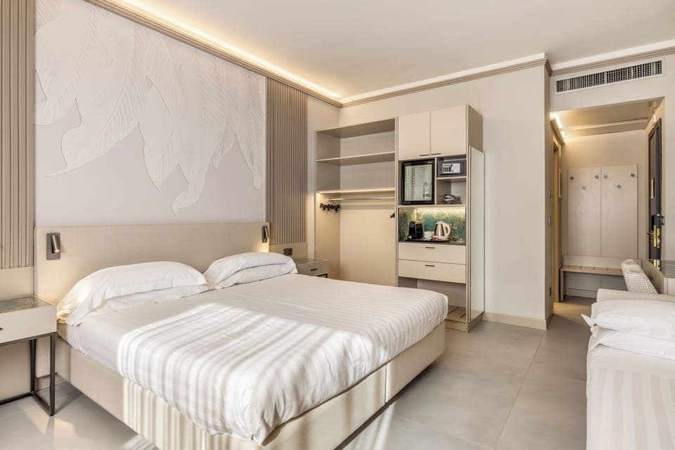 Exclusive Quadruple Room | Premium bedding, down comforters, minibar, in-room safe