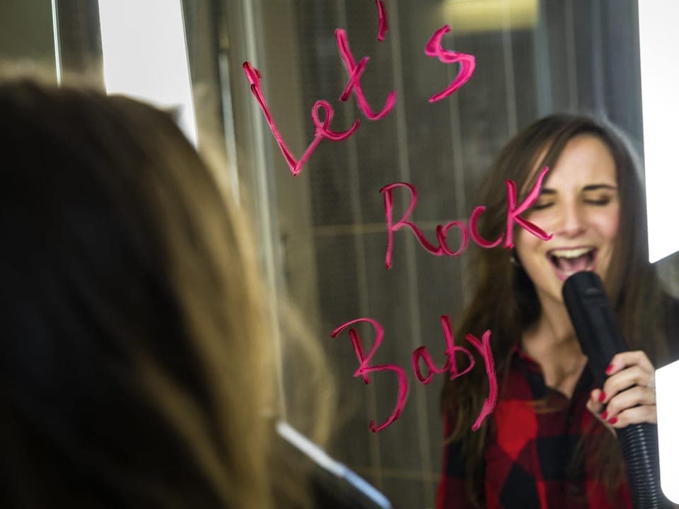 Premium bedding, desk, laptop workspace, blackout drapes