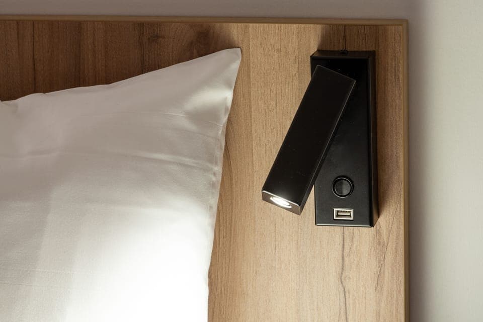 Premium bedding, desk, blackout drapes, soundproofing