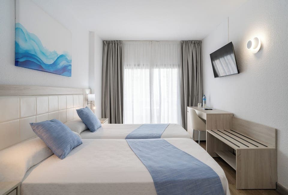 Desk, laptop workspace, blackout drapes, free WiFi