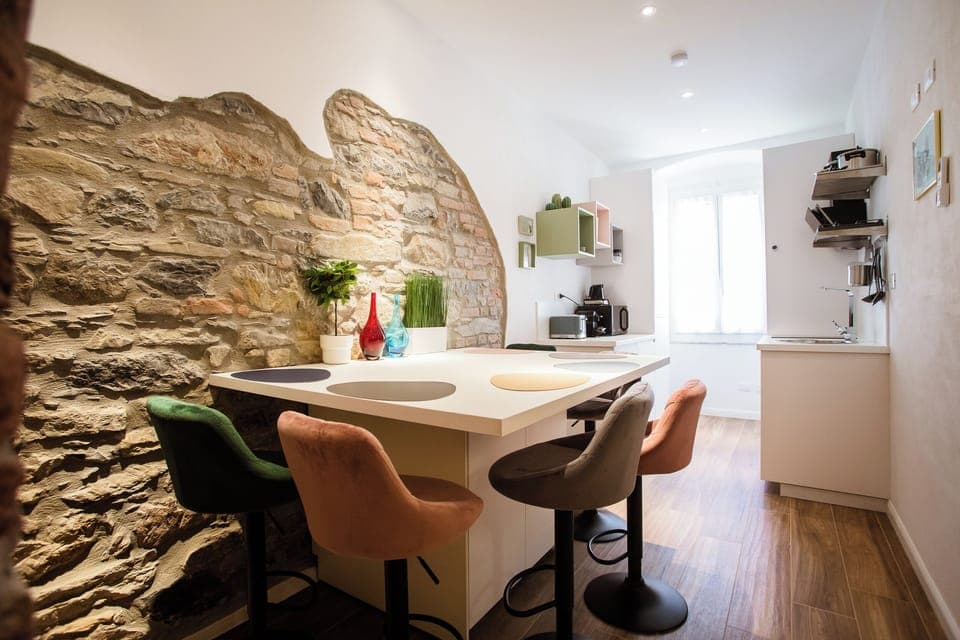 Design Apartment (Annex via Torino 35) | Private kitchen | Coffee/tea maker, electric kettle, dining tables