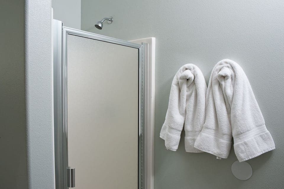 Second Floor Condo, 2 Bedrooms, Kitchen, Ocean View (Snuggle Inn) | Bathroom | Free toiletries, hair dryer, towels