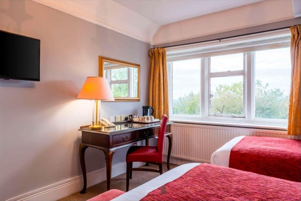 Desk, blackout drapes, soundproofing, iron/ironing board