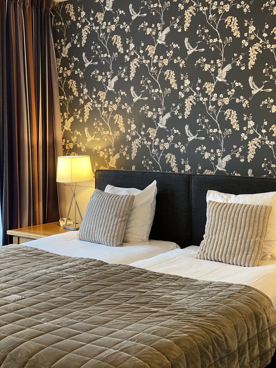 Down comforters, pillowtop beds, minibar, desk