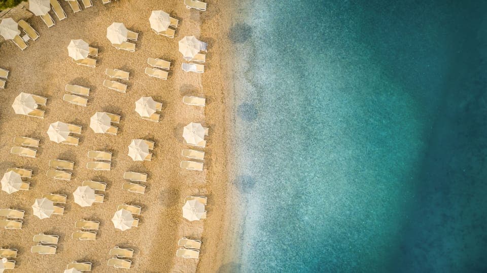 Beach nearby, sun loungers, beach umbrellas, motor boating