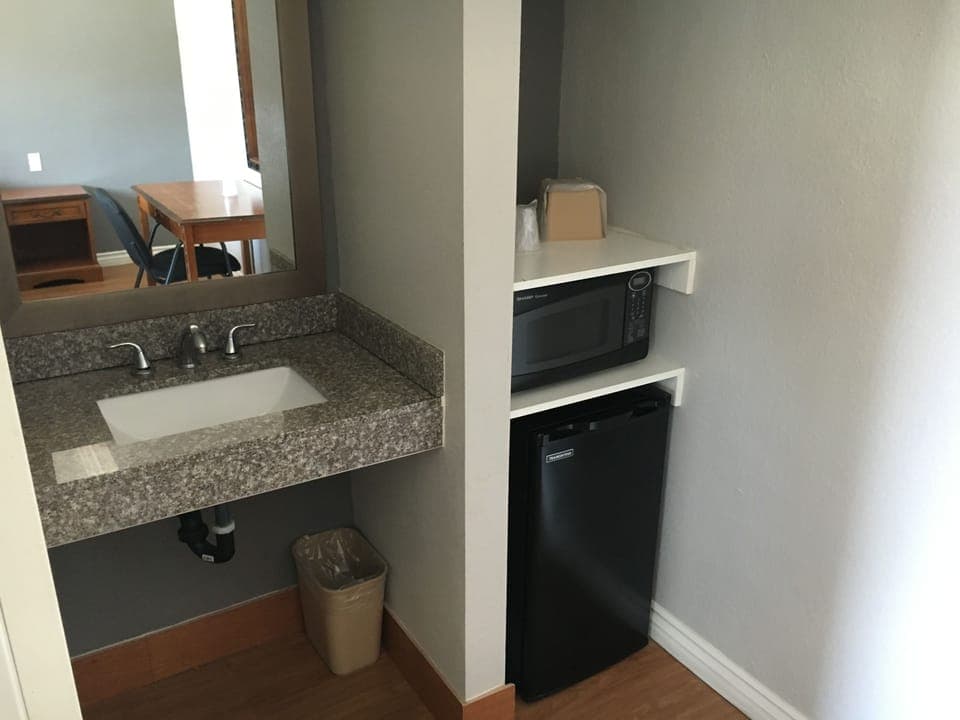 Standard Room, 1 Queen Bed | Private kitchenette | Fridge, microwave