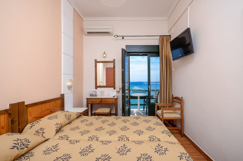 Standard Twin Room (Port View) | Down comforters, desk, iron/ironing board, free WiFi