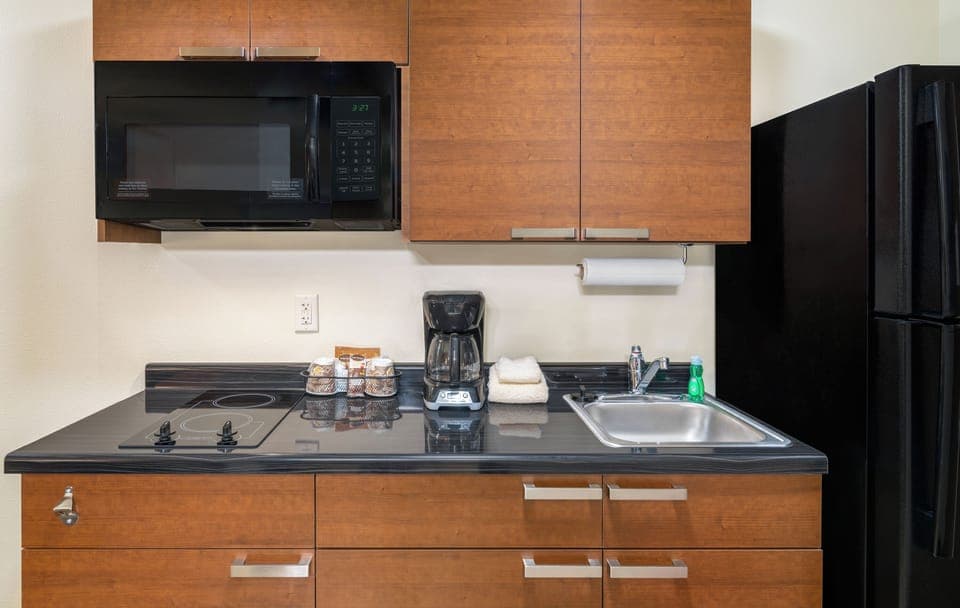 Fridge, microwave, stovetop, coffee/tea maker