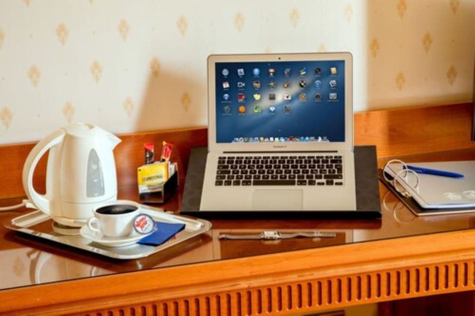 Premium bedding, down comforters, minibar, in-room safe