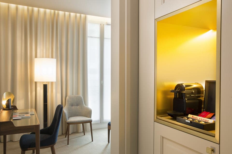 Premium bedding, free minibar items, in-room safe, desk