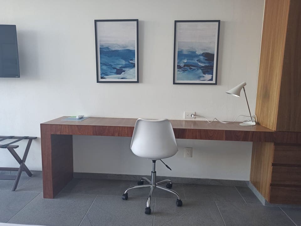 Deluxe Room | In-room safe, desk, iron/ironing board