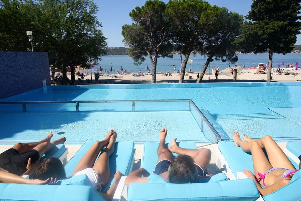 Indoor pool, seasonal outdoor pool, pool umbrellas, sun loungers