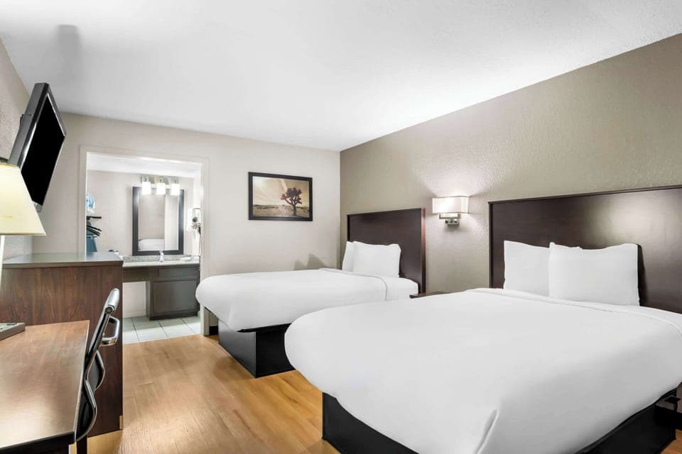 Standard Room, 2 Double Beds, Non Smoking | Desk, blackout drapes, iron/ironing board, free cribs/infant beds