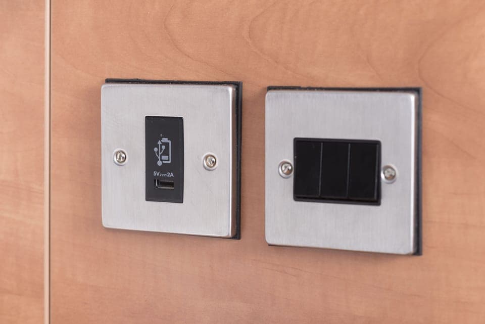 Premium bedding, desk, iron/ironing board, free cribs/infant beds