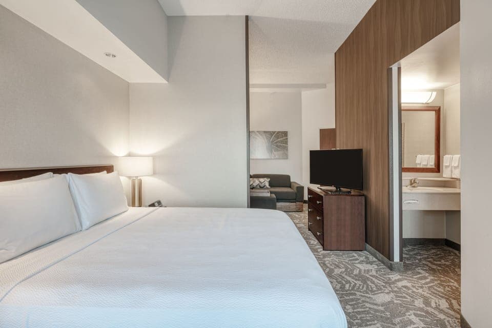 Premium bedding, desk, blackout drapes, iron/ironing board