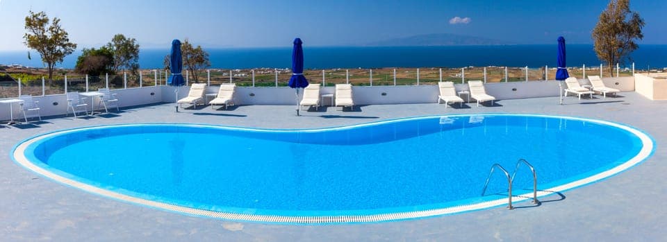 Outdoor pool, open 9:30 AM to 7:00 PM, pool umbrellas, sun loungers