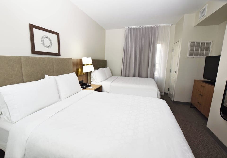 Pillowtop beds, in-room safe, blackout drapes, iron/ironing board