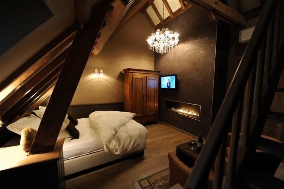 Family Room | Premium bedding, down comforters, blackout drapes, soundproofing