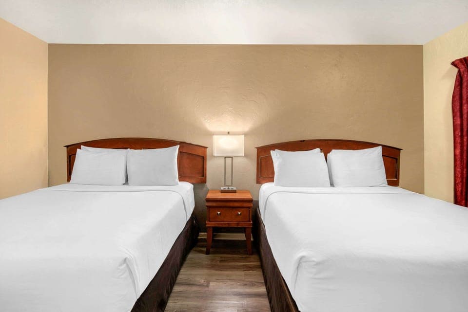 Standard Room, 2 Queen Beds, Non Smoking | Desk, iron/ironing board, free WiFi, bed sheets