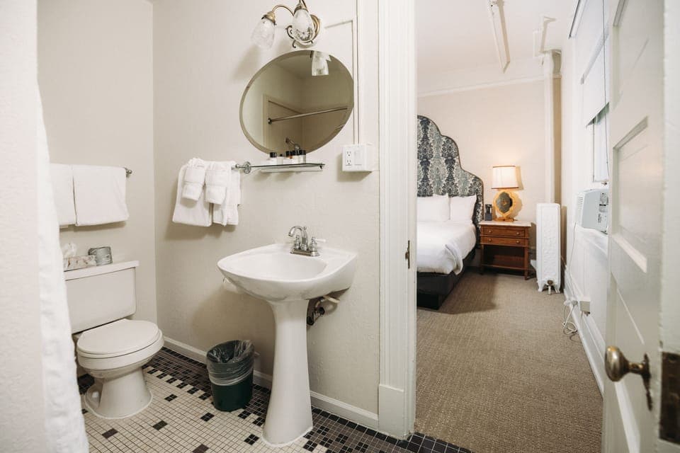 Classic King | Bathroom | Free toiletries, hair dryer, bathrobes, towels