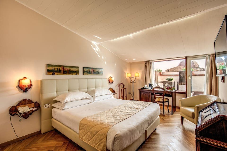 Double or Twin Room, Garden View | Minibar, in-room safe, desk, iron/ironing board