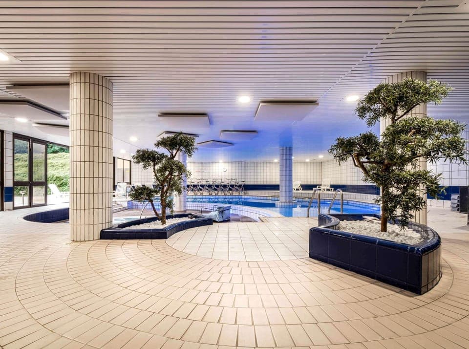 Indoor pool, open 8:00 AM to 9:00 PM, sun loungers