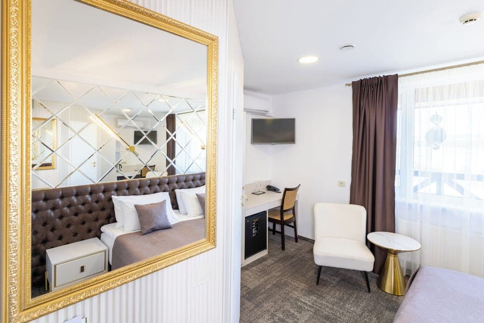 Standard Double Room | Living area | TV