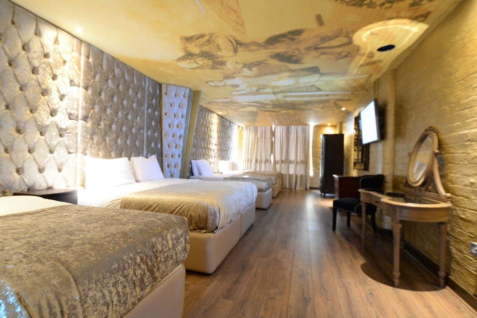 Luxury Room, Jetted Tub (sleeps 6) | Premium bedding, minibar, in-room safe, individually decorated