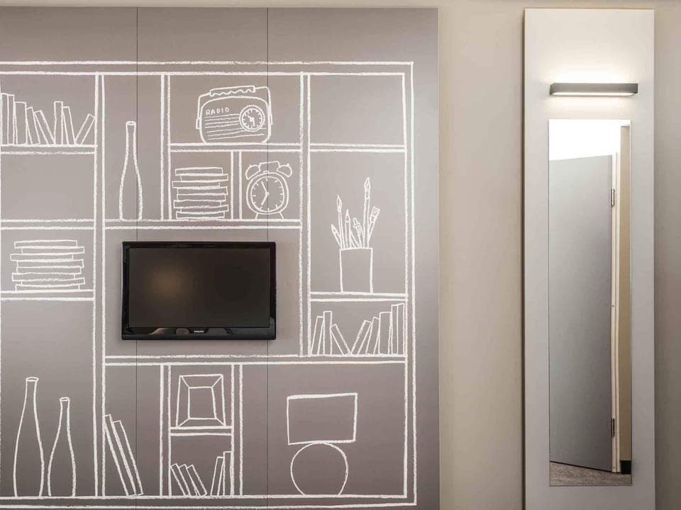 Blackout drapes, soundproofing, iron/ironing board