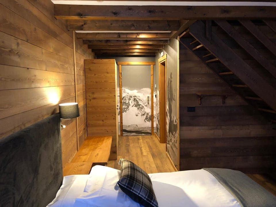 Down comforters, desk, laptop workspace, blackout drapes